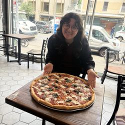 Tasty Tours NYC - Alex with our delicious pizza at Nolita pizza.