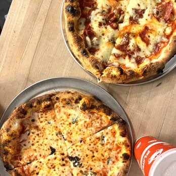Pummarola - The Falls - Our finished pizzas! Yay! - Pizza Near Me - Miami, Florida Pummarola - The Falls - Our finished pizzas! Yay! - Pizza Near Me - Miami, Florida