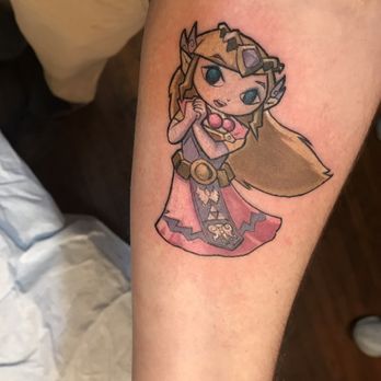 Gilded Cardinal Tattoo - Princess Zelda - Tattoo Near Me - Carrollton, Georgia Gilded Cardinal Tattoo - Princess Zelda - Tattoo Near Me - Carrollton, Georgia