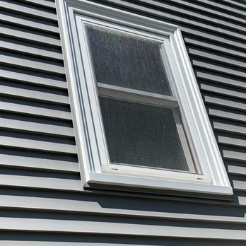 A&A Services Home Improvement - This shows the architectural details of the aluminum trim, around the windows and doors. The crew member is a real artist, shaping metal! - General Contractors Near Me - Salem, Massachusetts A&A Services Home Improvement - This shows the architectural details of the aluminum trim, around the windows and doors. The crew member is a real artist, shaping metal! - General Contractors Near Me - Salem, Massachusetts