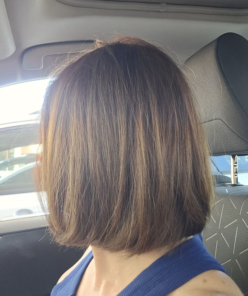 Blades Hair Design Logo