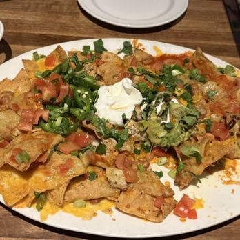 Yard House - Chicken Nachos with Gardien chicken( veg) - New American Near Me - San Jose, California Yard House - Chicken Nachos with Gardien chicken( veg) - New American Near Me - San Jose, California