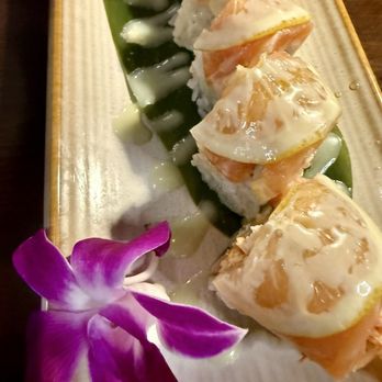 Kame Sushi - Salmon roll with lemon sauce on top - Sushi Bars Near Me - Frisco, Texas Kame Sushi - Salmon roll with lemon sauce on top - Sushi Bars Near Me - Frisco, Texas