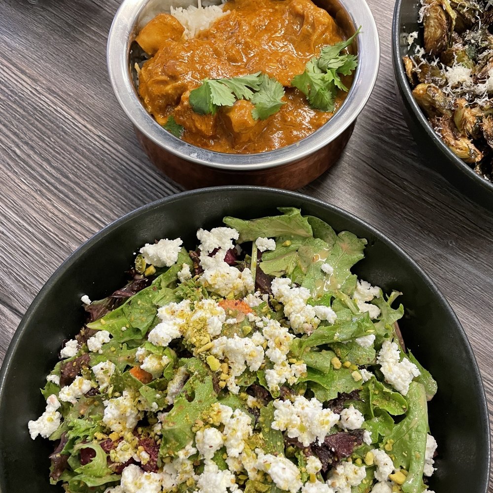 Beet salad in front and chicken tiki back Beet salad in front and chicken tiki back