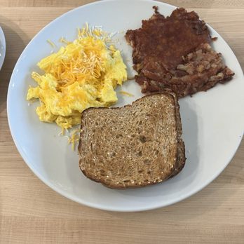 Eggsquisite Cafe - Hash with eggs and wheat toast - Breakfast & Brunch Near Me - Mansfield, Texas