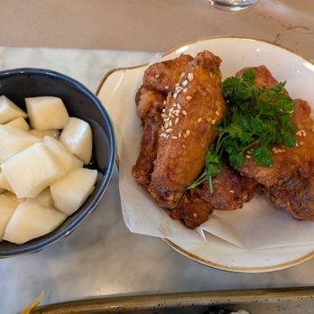 Kuun - Soy Garlic Chicken Wings (added white pickled radish) - Korean Near Me - Brooklyn, New York Kuun - Soy Garlic Chicken Wings (added white pickled radish) - Korean Near Me - Brooklyn, New York