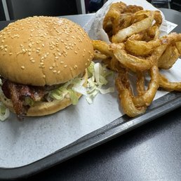 Bacon Cheeseburger and a side of onion rings Bacon Cheeseburger and a side of onion rings