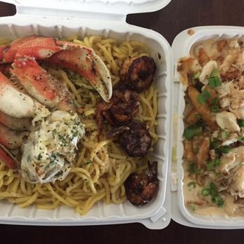 Chef Smelly's - The garlic noodles with crab & prawns on the left & the crab fries with cheese sauce on the right. DELICIOUS!!!! - Cajun/Creole Near Me - Oakland, California Chef Smelly's - The garlic noodles with crab & prawns on the left & the crab fries with cheese sauce on the right. DELICIOUS!!!! - Cajun/Creole Near Me - Oakland, California