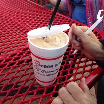 Cook Out - a woman eating a cup of ice cream - Fast Food Near Me - Statesboro, Georgia Cook Out - a woman eating a cup of ice cream - Fast Food Near Me - Statesboro, Georgia
