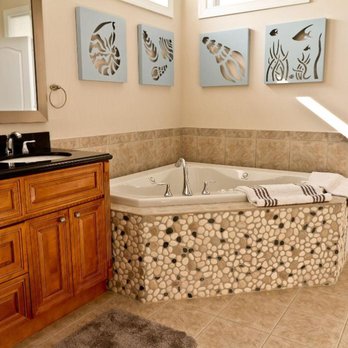 Made Anew - Home Remodeling - a bathtub in a bathroom - General Contractors Near Me Made Anew - Home Remodeling - a bathtub in a bathroom - General Contractors Near Me
