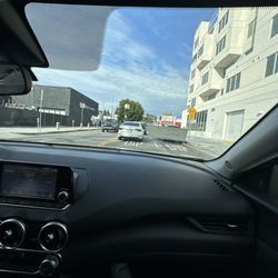 Economy Rent a Car - Sticker in the middle of the window of front passenger side obstructing view