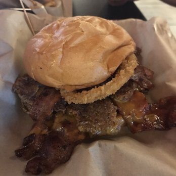 Johnny Rockets - Our F U burger when we sent our doubleburger back. Smashed patties, 1 sad onion ring - Diners Near Me - Kapolei, Hawaii