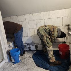 LJA Home Improvements - Grouting tile that existed.