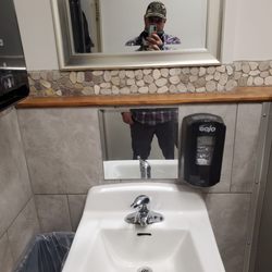 The Gin Mill & Grille - If that lower mirror is there for the reason I think its there for, whoever thought of it is a genius.  Drip check mirror