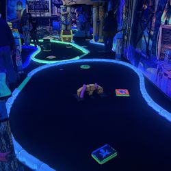 Blackbeard's Cove Adventure Golf - Cool changing color lights around the edges of the hole
