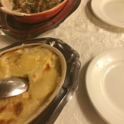Le Mas du Murinais - Le plat, des grenouilles persillées au beurre avec un gratin dauphinois.
