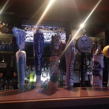 Revolver North - a row of beer taps at a bar - Dive Bars Near Me - Spokane, Washington Revolver North - a row of beer taps at a bar - Dive Bars Near Me - Spokane, Washington