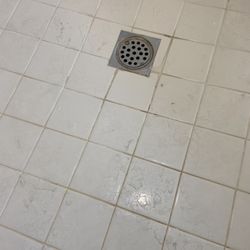 G&M Cleaning Services - Shower floor full of scum and hard water stains