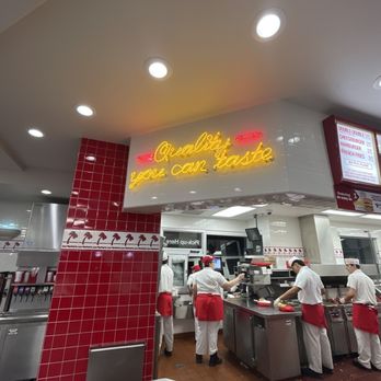 In-N-Out Burger - ows a restaurant kitchen with workers preparing food - Burgers Near Me - Phoenix, Arizona