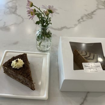 Sweet Boutique - Left = Chocolate Honey Cake and right = Almond Cake (spoiler, it didn't make it home without a bite or two taken), Oct 2026. - Coffee & Tea Near Me - Morrisville, North Carolina
