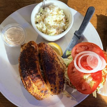 Jerry's Grille - Overview of my fish sandwich and slaw. I'd eat this again anytime! - American Near Me - Jacksonville, Florida