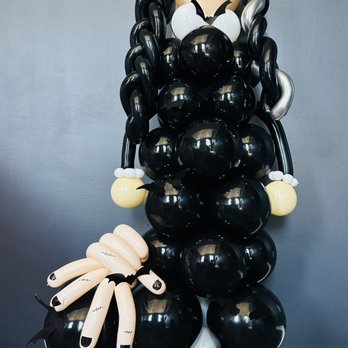 Jump City - Wednesday Addams - Balloon Services Near Me - Imlay City, Michigan Jump City - Wednesday Addams - Balloon Services Near Me - Imlay City, Michigan