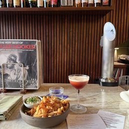 FRENCH FRIES and a Mod-tini with tequila instead of vodka. FRENCH FRIES and a Mod-tini with tequila instead of vodka.