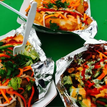 Nammi Truck - three plates of food on a table - Vietnamese Near Me Nammi Truck - three plates of food on a table - Vietnamese Near Me