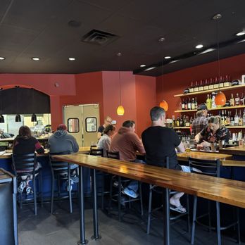 The Neighborhood - Bar area and kitchen - Pizza Near Me - Seattle, Washington The Neighborhood - Bar area and kitchen - Pizza Near Me - Seattle, Washington