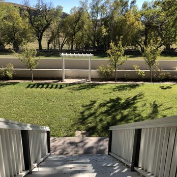 Tinnie Silver Dollar - a view of a grassy area with trees - Steakhouses Near Me - Tinnie, New Mexico