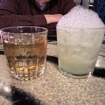 Happy Accidents - Left is Be Mighty (my fave of the night) right is the Sorry Not Sorry--wow!!  Salt foam on top, husbands drink but my sip was crazy good - Bars Near Me - Albuquerque, New Mexico