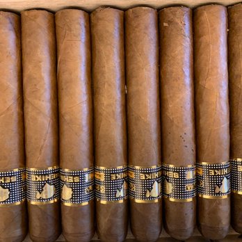 North Coast Cigar - cigars lined up in a row - Tobacco Shops Near Me - Port Clinton, Ohio North Coast Cigar - cigars lined up in a row - Tobacco Shops Near Me - Port Clinton, Ohio