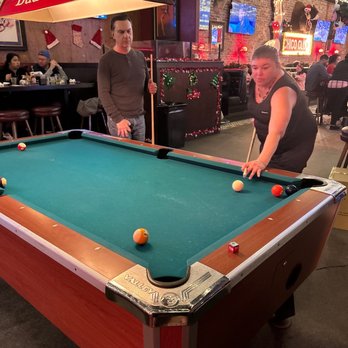 The District Lounge - Us winning at pool. - New American Near Me - Orange, California