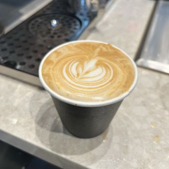 New Here Coffee - oat milk flat white - Coffee & Tea Near Me - Knoxville, Tennessee New Here Coffee - oat milk flat white - Coffee & Tea Near Me - Knoxville, Tennessee