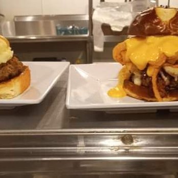 Froggy's Bar & Grill - On the right is the bacon beer cheese burger very delicious. And to the left the pot roast burger. Really good. - Bars Near Me - Rock Falls, Illinois
