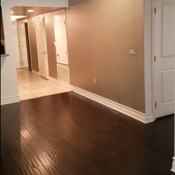 Floor Zone - Before - Dark wood flooring and tiles. - Flooring Near Me Floor Zone - Before - Dark wood flooring and tiles. - Flooring Near Me