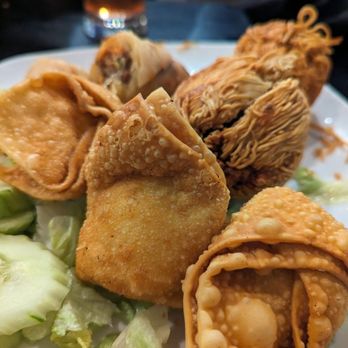 Sawatdee Saint Paul - Appetizer platter with fried spring rolls, cream cheese wontons and sarongs. So good! - Thai Near Me - St Paul, Minnesota Sawatdee Saint Paul - Appetizer platter with fried spring rolls, cream cheese wontons and sarongs. So good! - Thai Near Me - St Paul, Minnesota