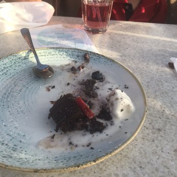 Poseidon on the Beach - Almost finished chocolate lava cake - Seafood Near Me - Del Mar, California Poseidon on the Beach - Almost finished chocolate lava cake - Seafood Near Me - Del Mar, California