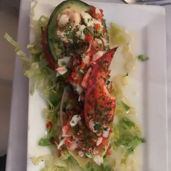 Marbella Restaurant - Seafood Stuffed Avocado appetizer - Spanish Near Me - Bayside, New York Marbella Restaurant - Seafood Stuffed Avocado appetizer - Spanish Near Me - Bayside, New York