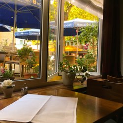 Olive - View of courtyard tables