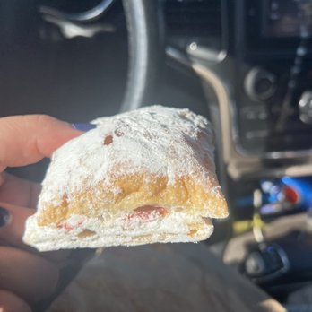 El Coqui Panaderia - a hand holding a pastry - Bakeries Near Me - Philadelphia, Pennsylvania El Coqui Panaderia - a hand holding a pastry - Bakeries Near Me - Philadelphia, Pennsylvania