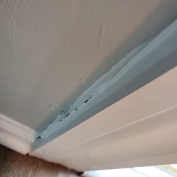 Erich's Carpentry - Horrible job caulking the door. - Siding Near Me