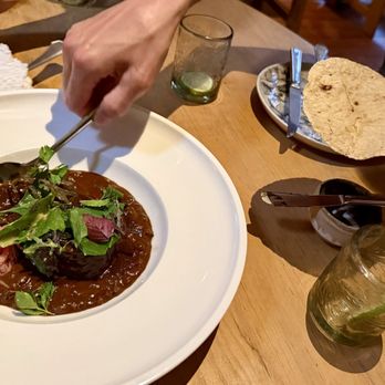 Maximo - Beer braised Wagyu Cross beef tongue, beans from the pot with mole, pickled onion $720 - México, D.F., DIF