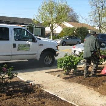 John's Gardening Service - a man working in the garden - Landscaping Near Me - Newman, California John's Gardening Service - a man working in the garden - Landscaping Near Me - Newman, California