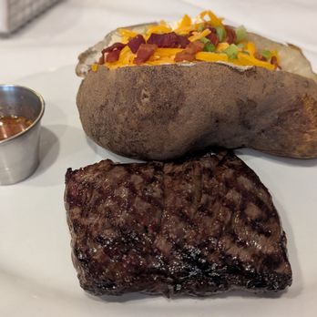 Metro 8 Steakhouse - Churrasco with loaded potato - Steakhouses Near Me - Durham, North Carolina