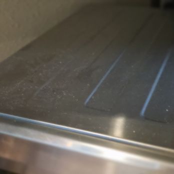 Molly Maid of St. Petersburg / Clearwater - Top of toaster oven - Home Cleaning Near Me - Clearwater, Florida