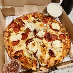 9 in personal pizza with red pepper flakes, parmesan, and ranch. 9 in personal pizza with red pepper flakes, parmesan, and ranch.