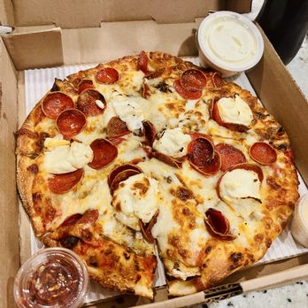 Luna Pizzeria - 9 in personal pizza with red pepper flakes, parmesan, and ranch. - Pizza Near Me - Houston, Texas Luna Pizzeria - 9 in personal pizza with red pepper flakes, parmesan, and ranch. - Pizza Near Me - Houston, Texas