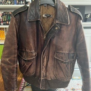 Leather Care Specialists - Pre-repair front - Leather Goods Near Me - Avon, Illinois Leather Care Specialists - Pre-repair front - Leather Goods Near Me - Avon, Illinois