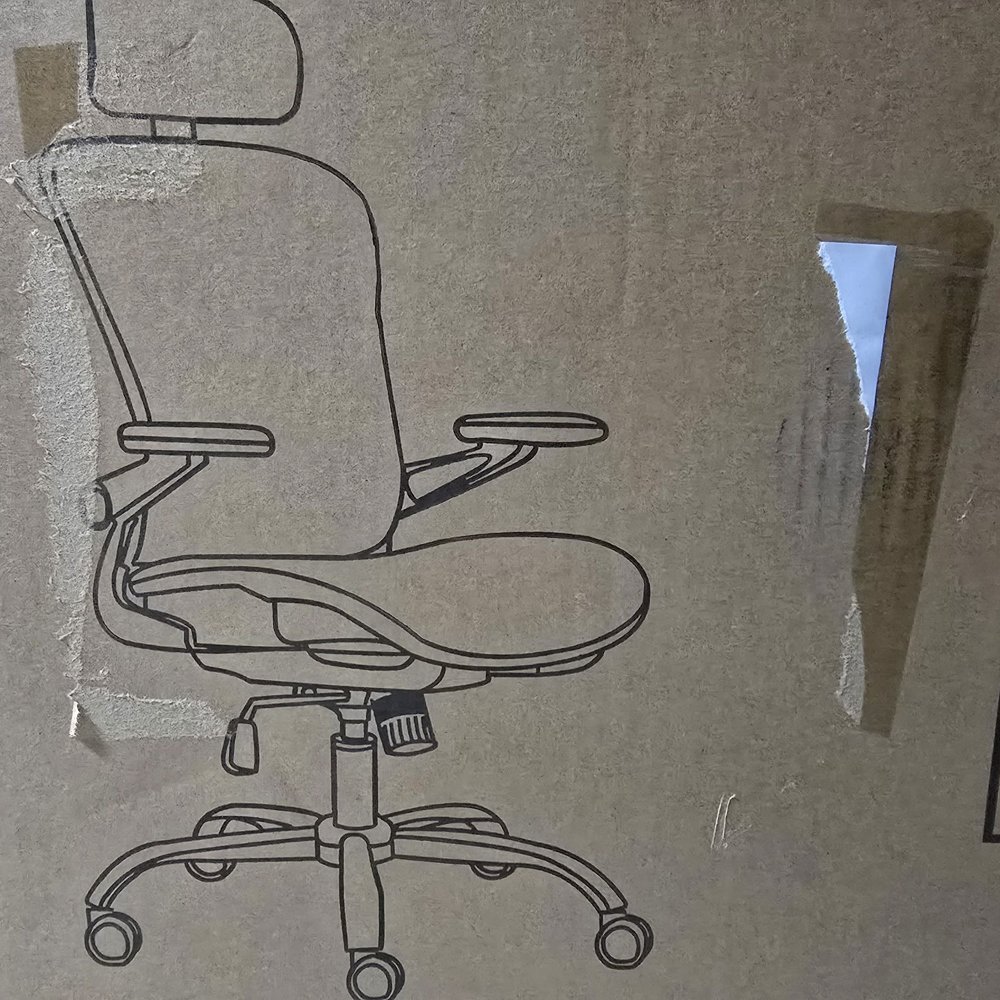 The paper they taped on covered what the chair really is The paper they taped on covered what the chair really is